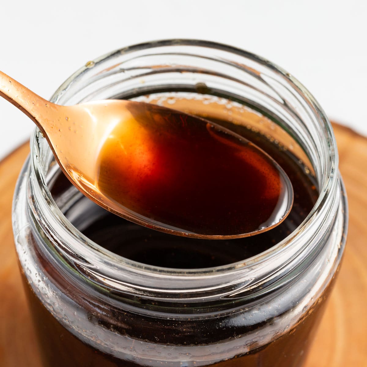 a jar of apple brown sugar syrup