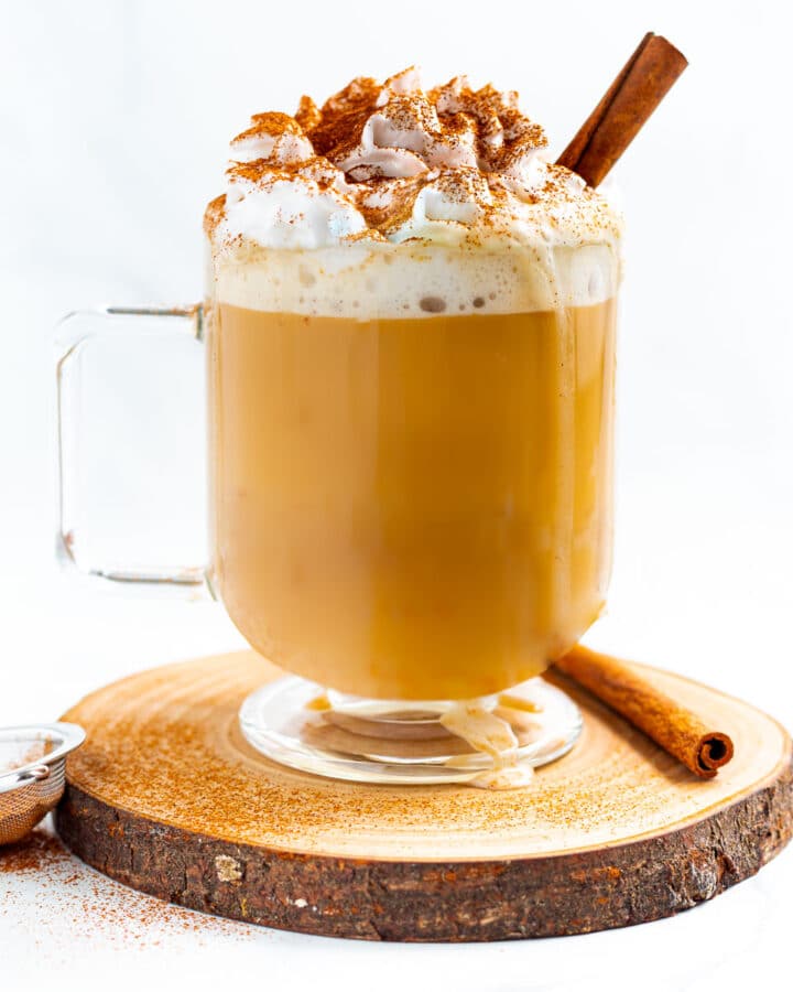 a vegan pumpkin spice latte topped with dairy-free whipped cream