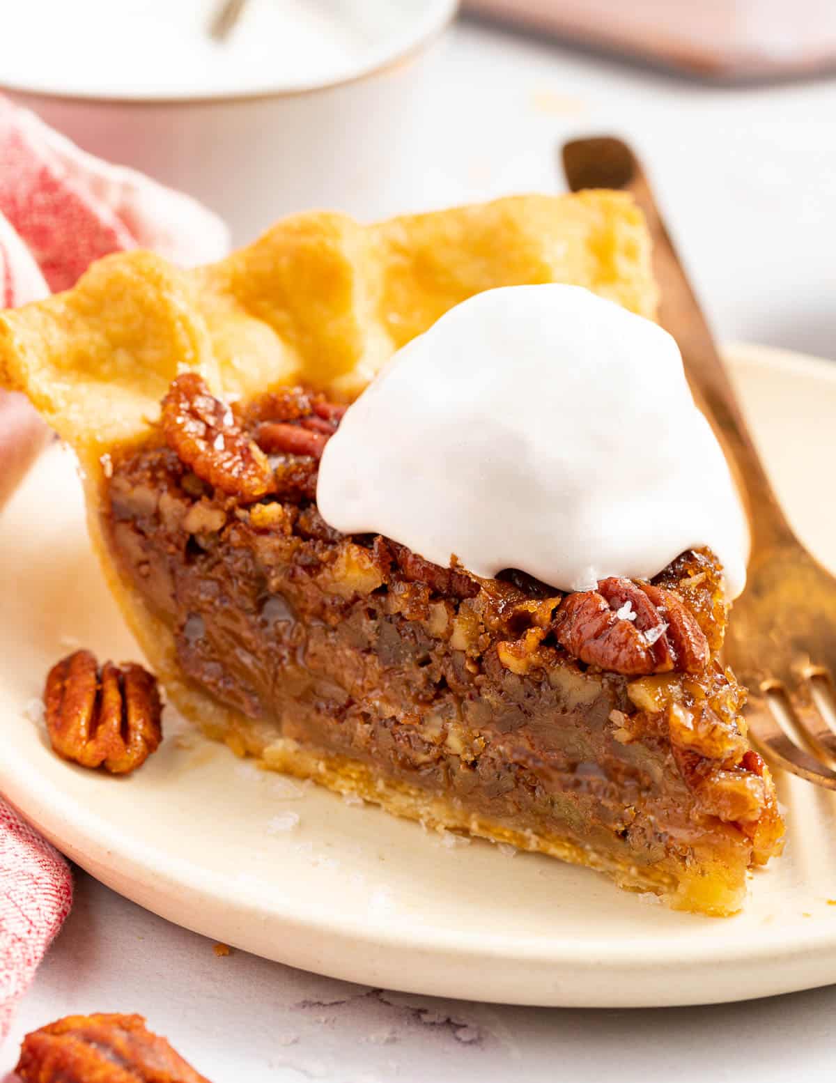 a slice of pecan pie with cocowhip
