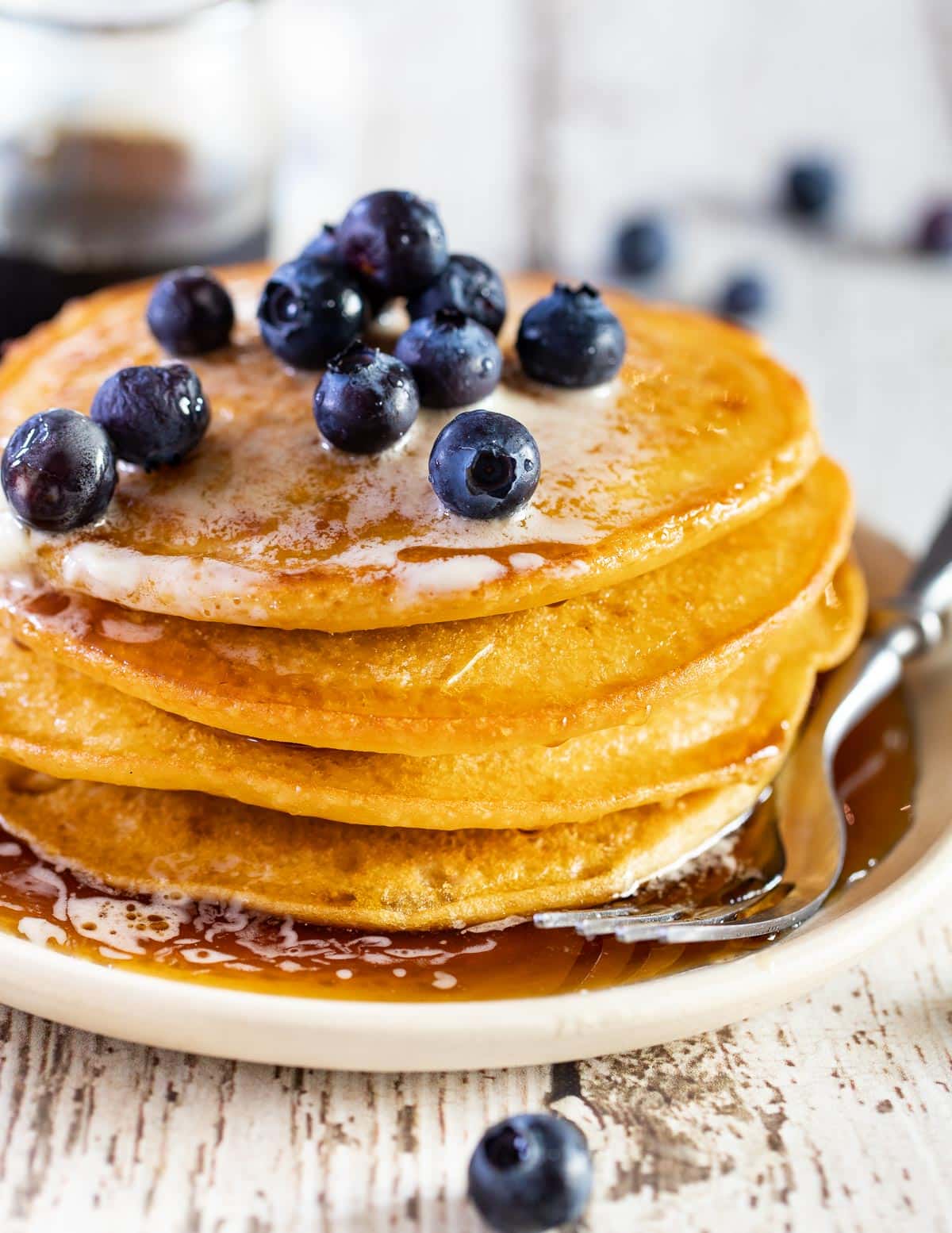 s stack of corn flour pancakes with blueberries
