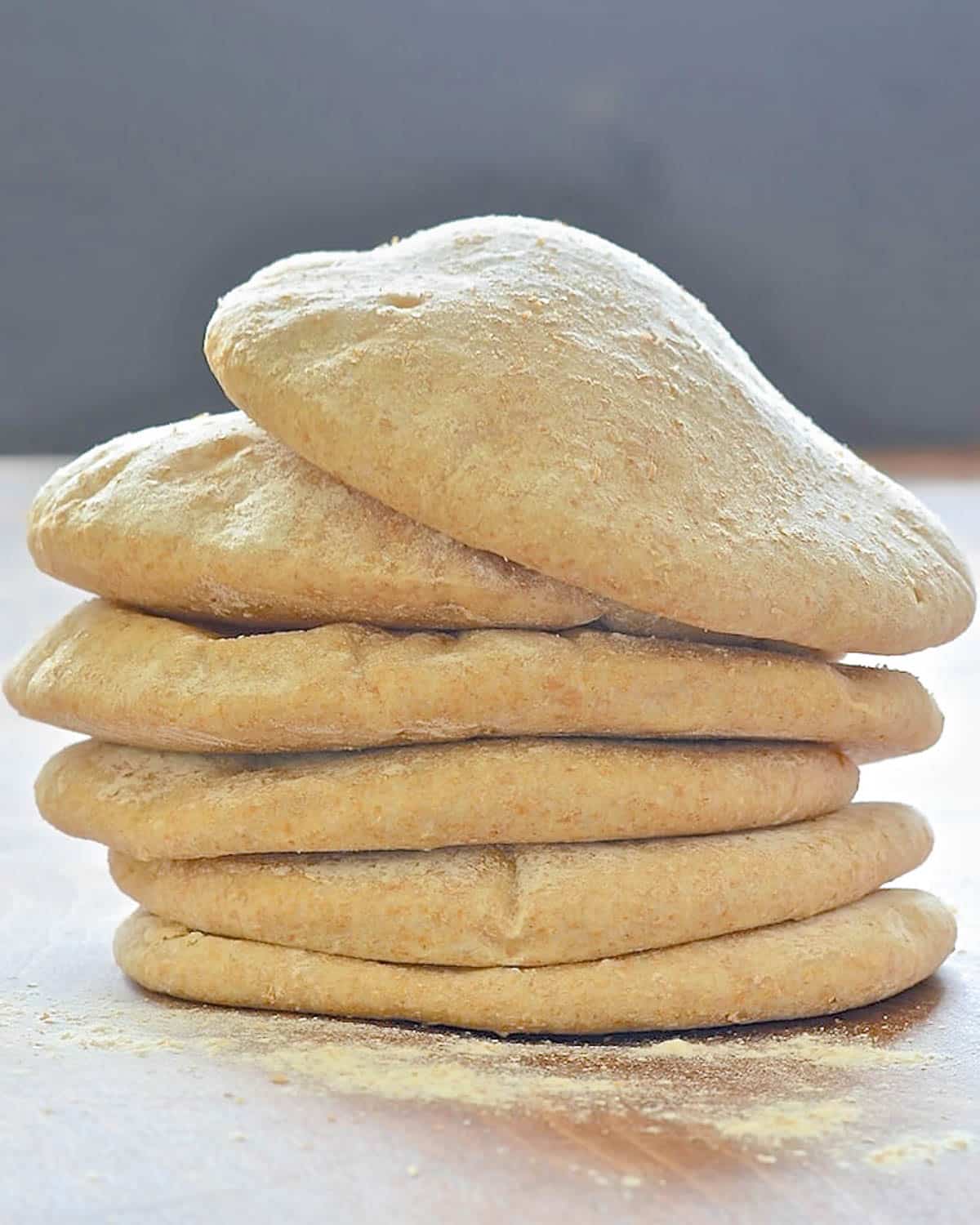 a stack of puffy pita bread