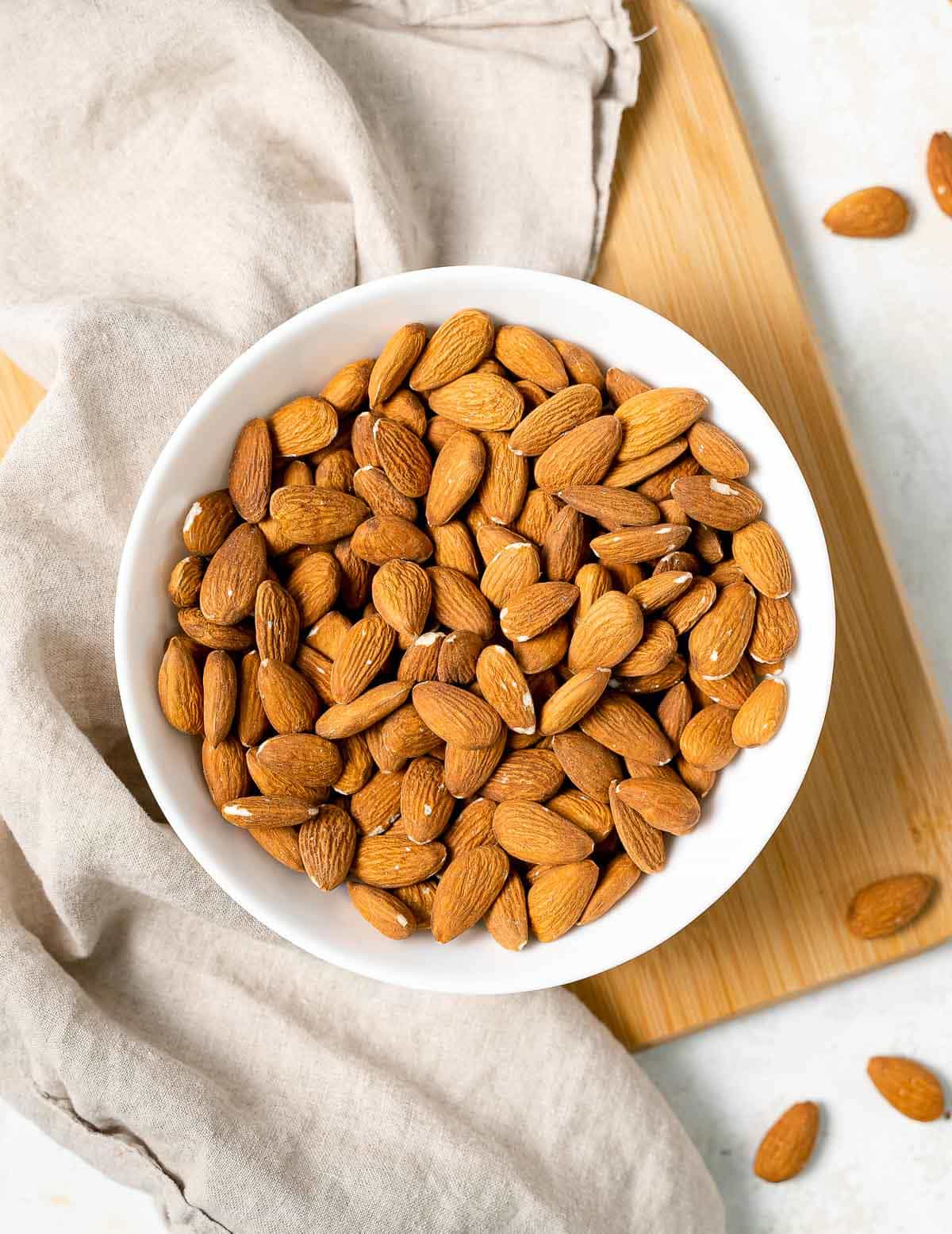 a bowl of raw almonds