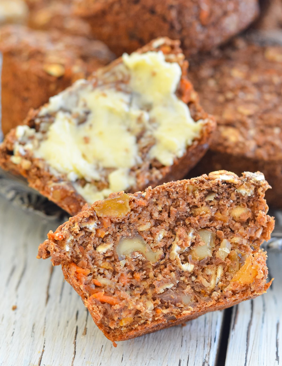 half of a carrot muffin. The inside clearly visible. 