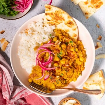 chickpea & lentil curry with rice and pickled red onions