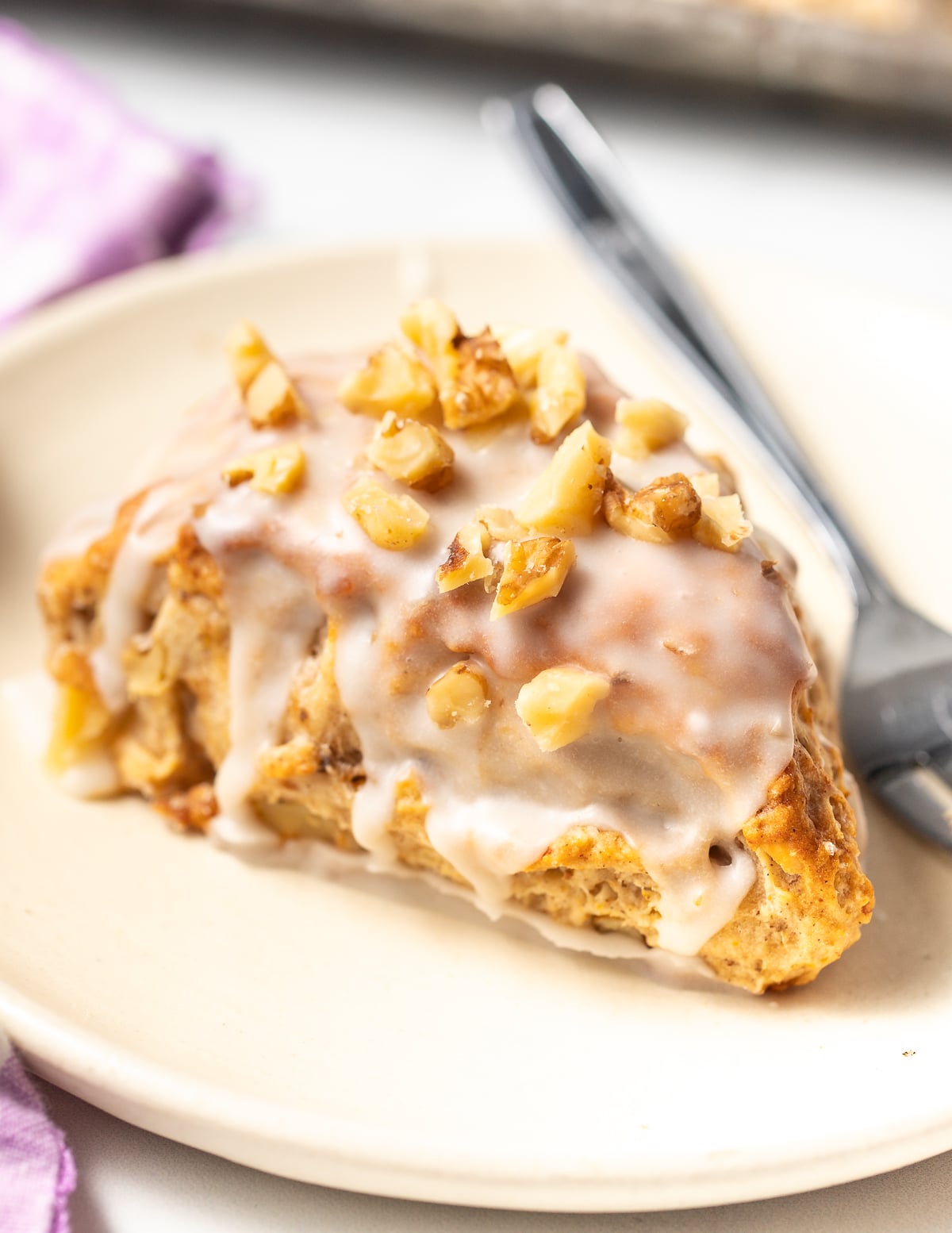 one vegan banana scones with glaze and walnuts