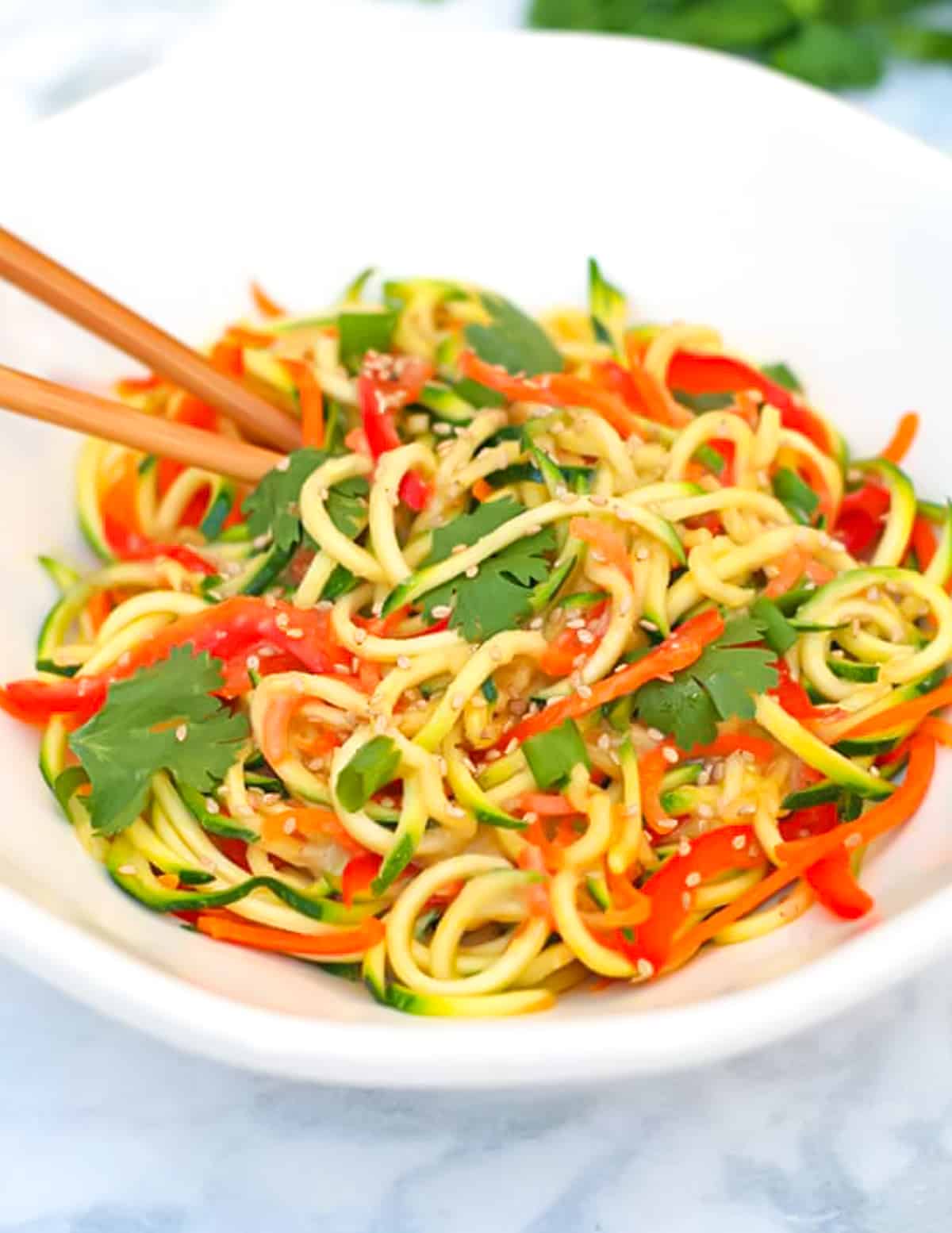 a bow of vegan miso zucchini noodles