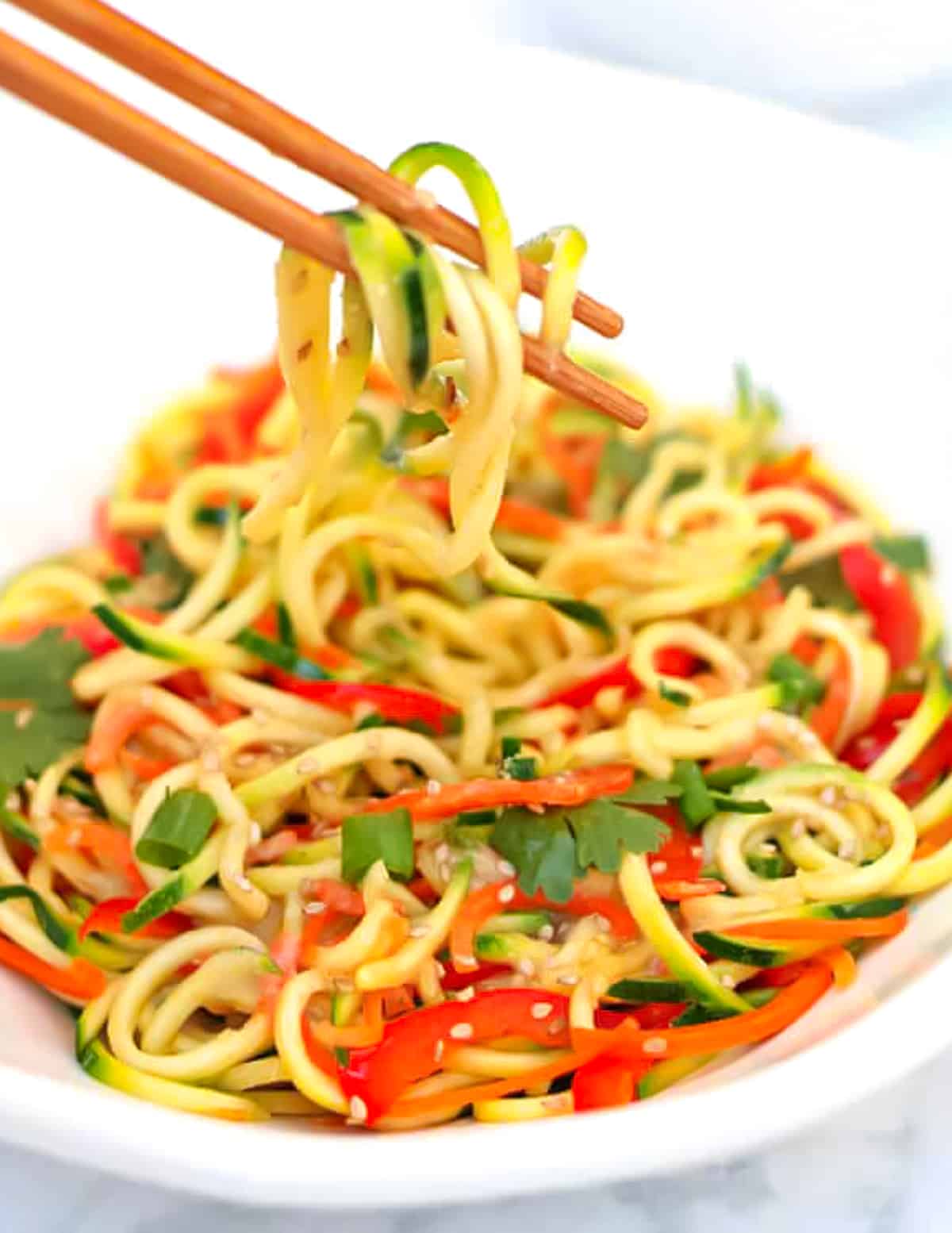 a bowl of zoodles with chopsticks