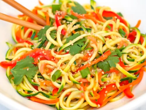 Making Zucchini Noodles with Spiral Slicer on Table Stock Image