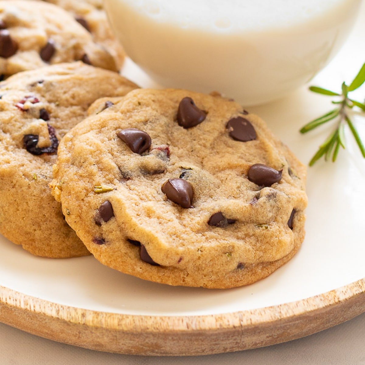 a vegan rosemary chocolate chip cookie on a plate