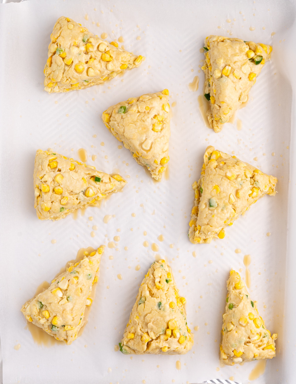 unbaked scones on a baking tray