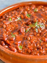vegan baked beans in a terracotta dish