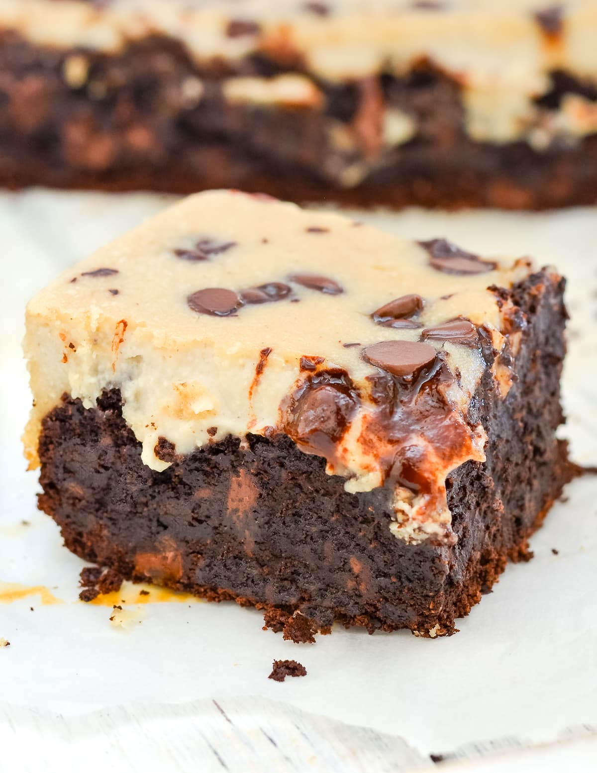 a gooey vegan cheesecake brownie