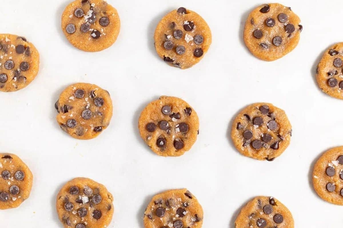 uncooked almond flour chocolate chip cookies sprinkled with flaky sea salt