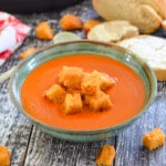 a bowl of Instant Pot tomato soup with croutons