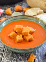 a bowl of Instant Pot tomato soup with croutons