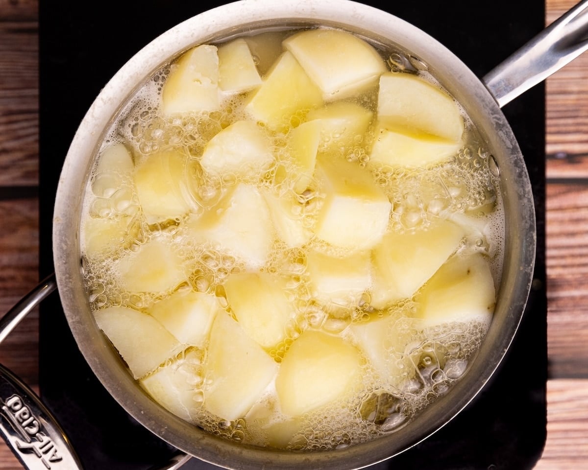 potatoes boiling in a pan