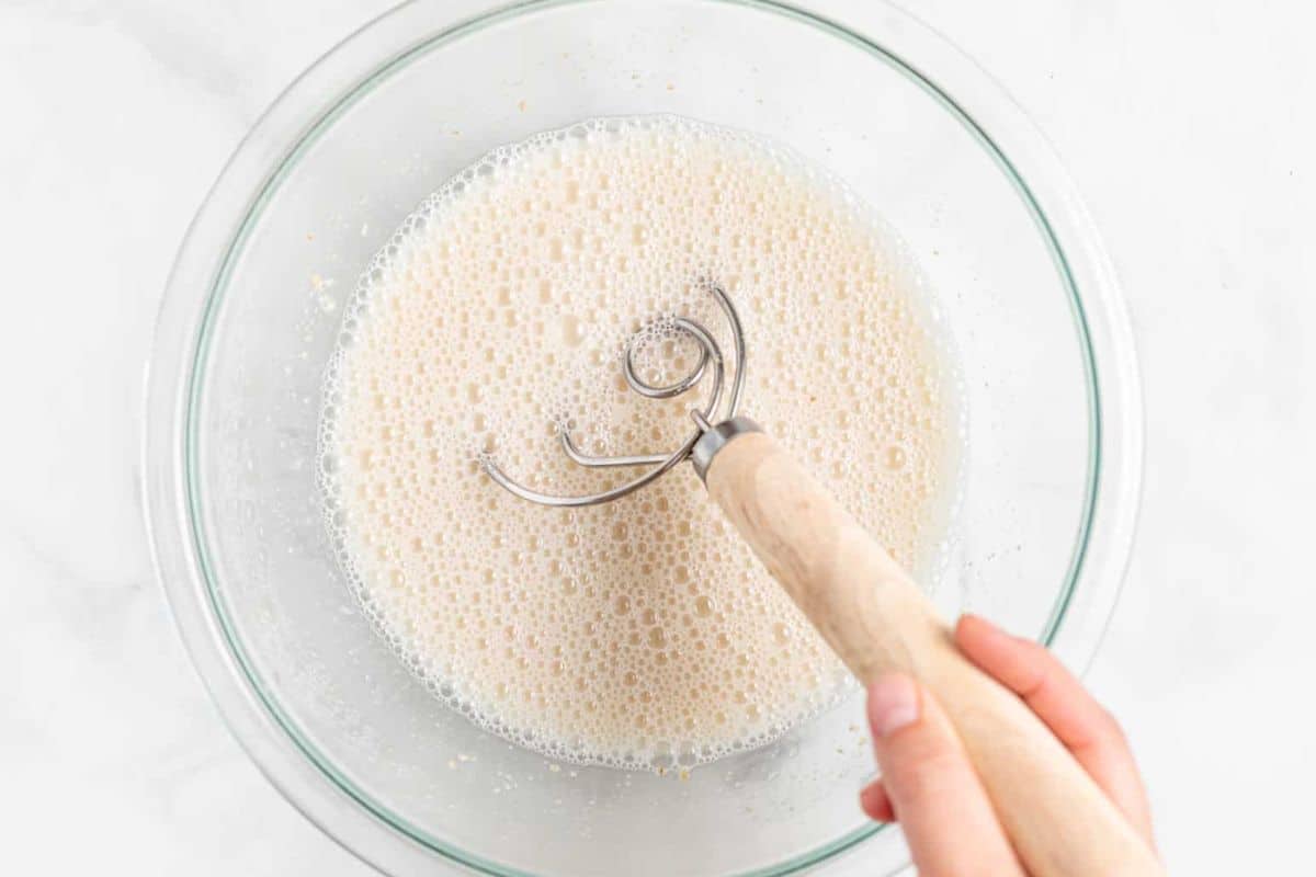 sourdough starter and water mixed in a bowl