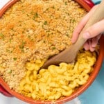 a dish of baked mac and cheese with a crispy golden breadcrumb topping