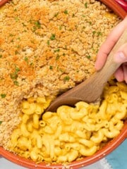 a dish of baked mac and cheese with a crispy golden breadcrumb topping