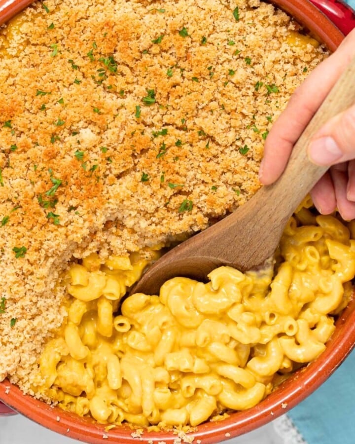 a dish of baked mac and cheese with a crispy golden breadcrumb topping