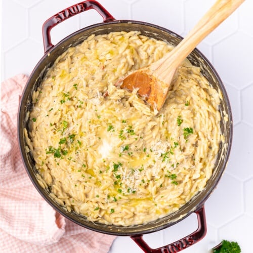 a pan full of creamy vegan orzo risotto