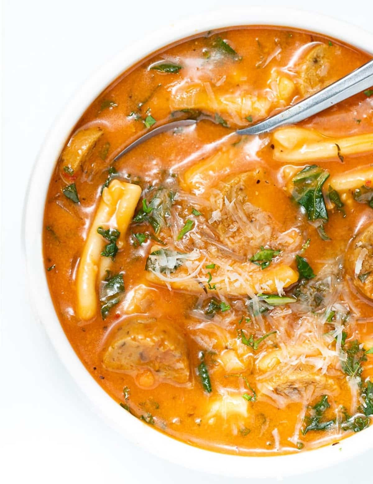 close up of a bowl of vegan sausage soup with pasta