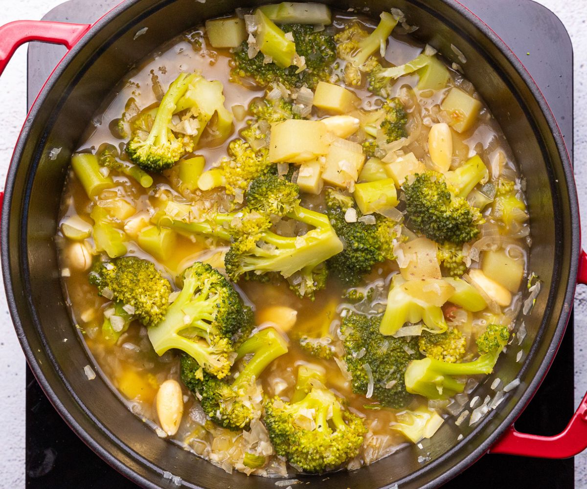 broccoli soup in a pan before being blended