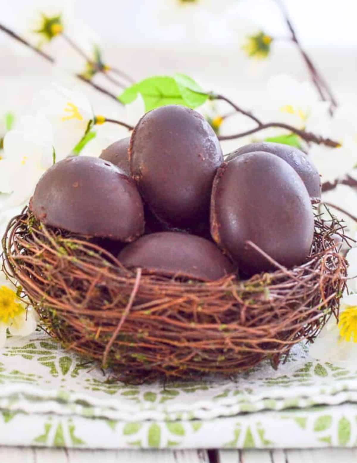 a nest full of vegan caramel eggs