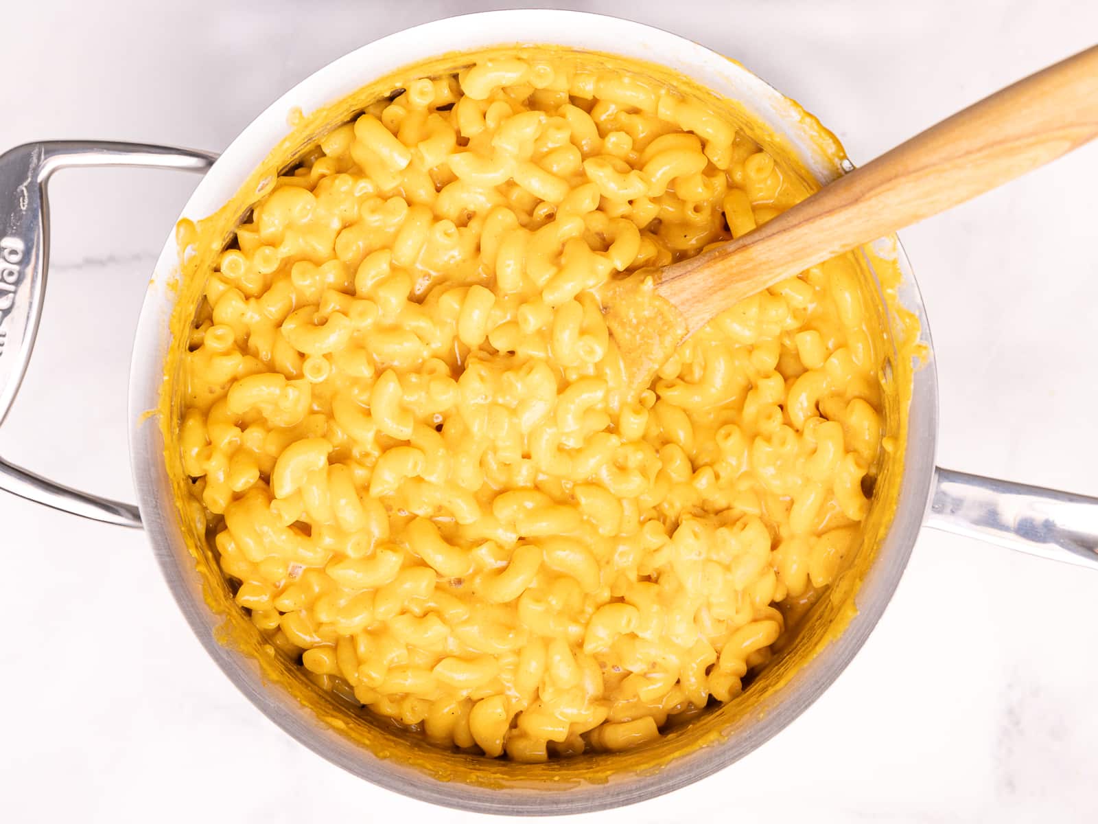 macaroni tossed in cheese sauce