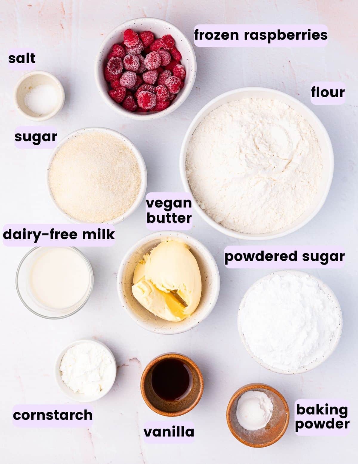frozen raspberries, salt, sugar, flour, vegan butter, dairy-free milk, powdered sugar, vegan butter, cornstarch, vanilla, baking powder. 