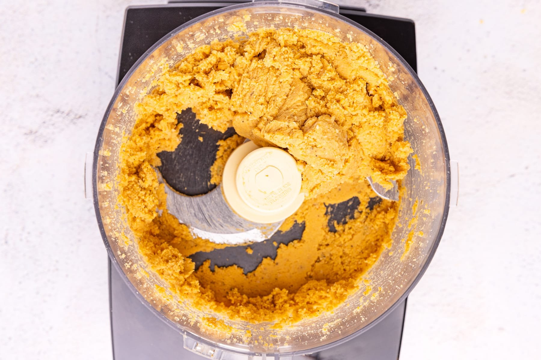 blended chickpea mixture in a food processor
