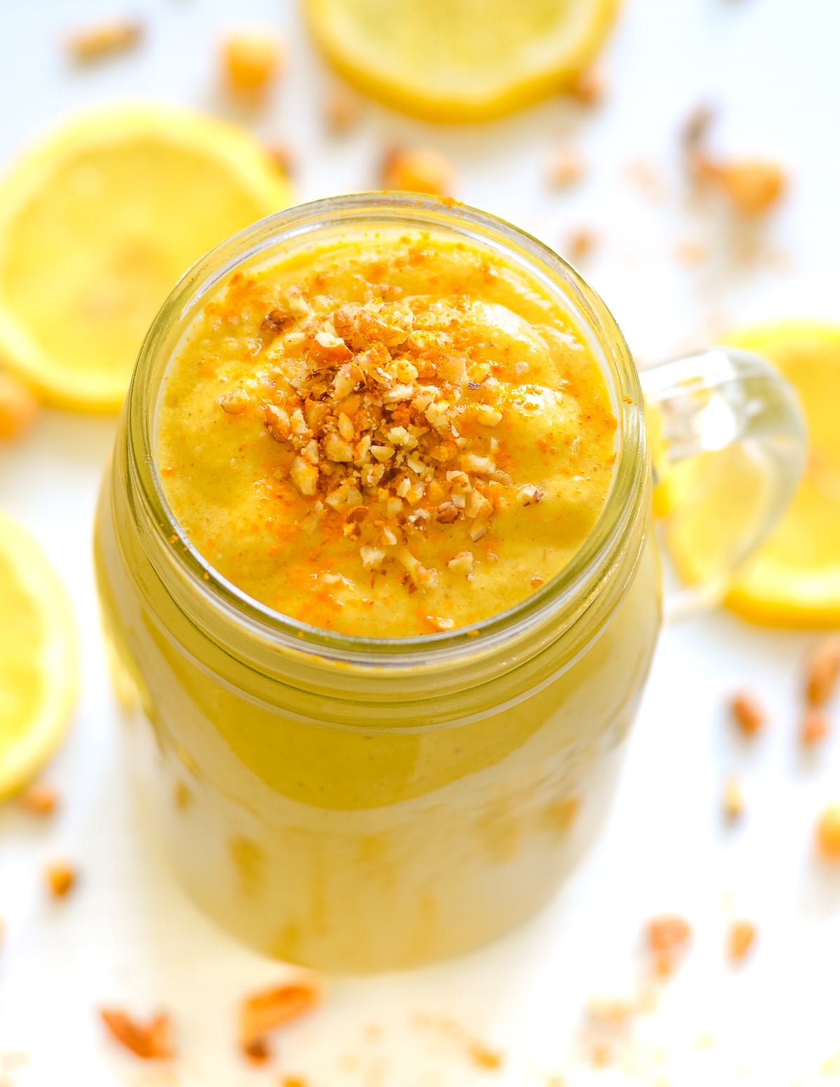 a lemon cheesecake smoothie with "cookie" crumbles on top.