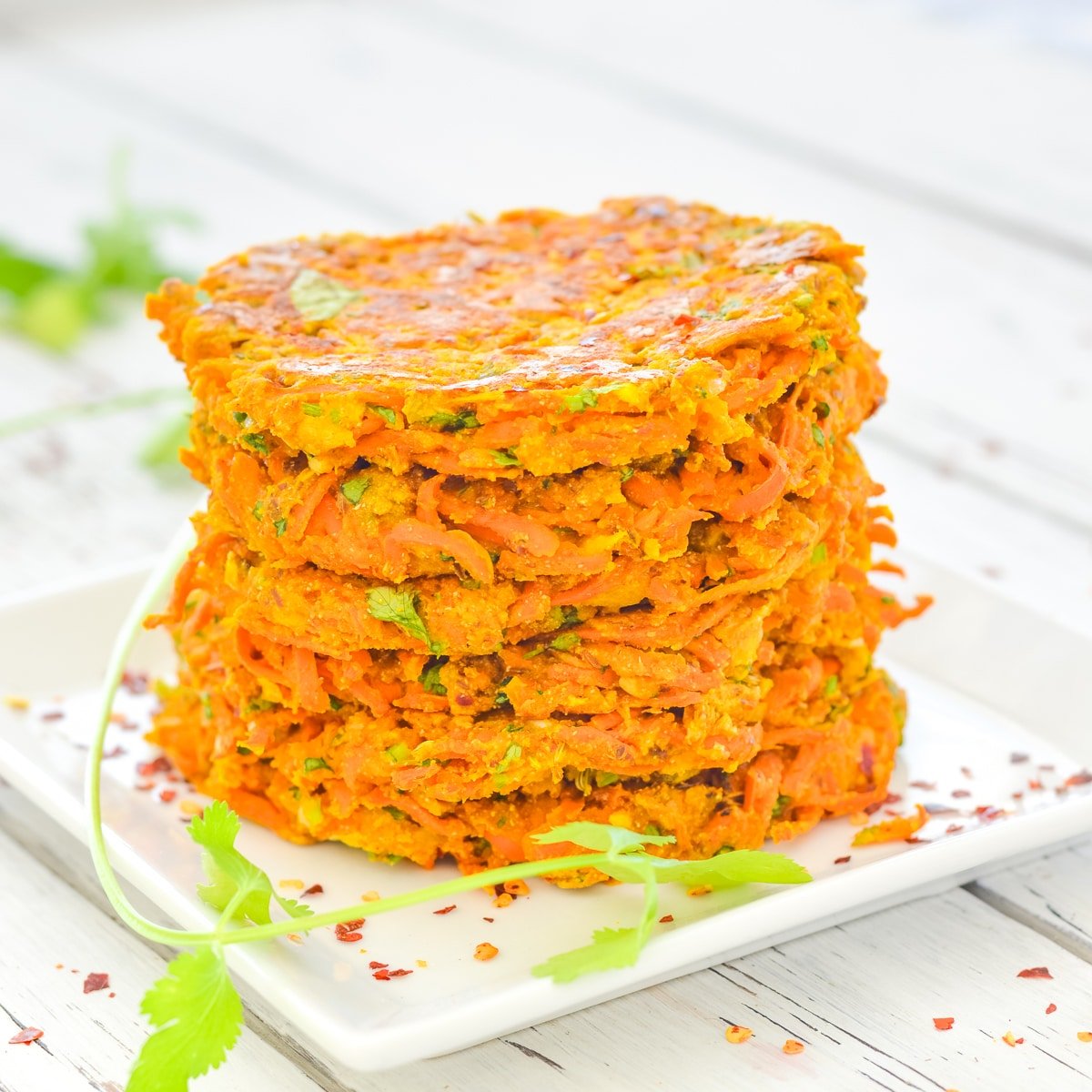 a stack of carrot fritters