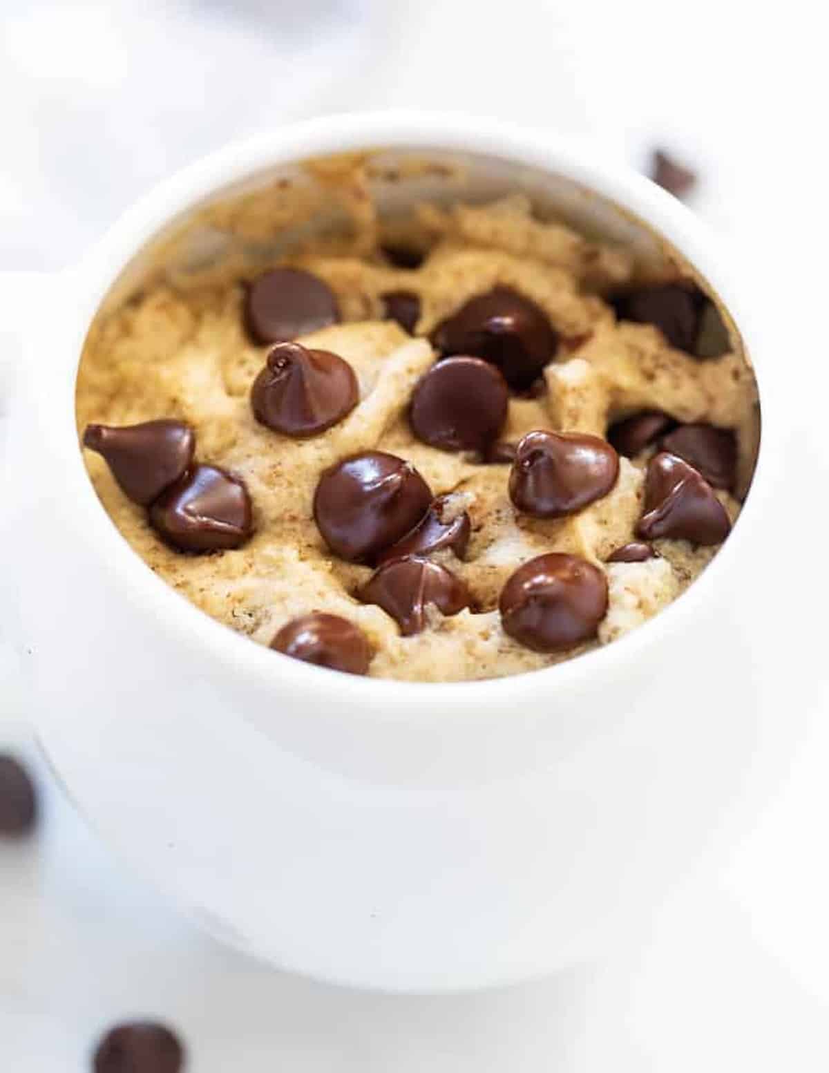 a chocolate chip cookie in a mug
