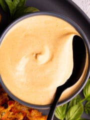 a bowl of creamy vegan sriracha sauce