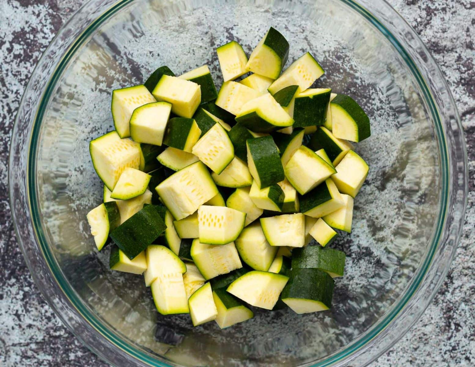 a bowl of chopped zucchini