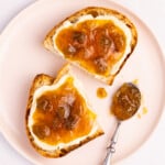 2 pieces of bread spread with vegan butter and fig jam