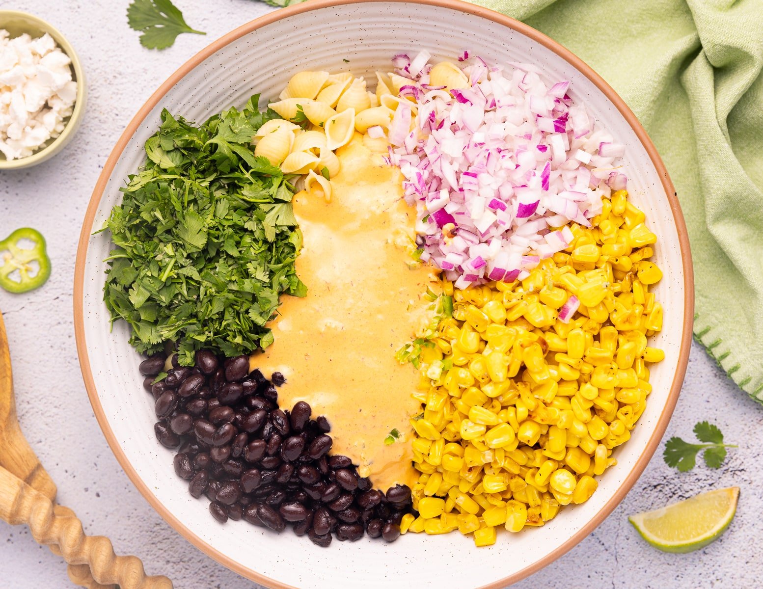 salad ingredients in a bowl. Not yet tossed together. 