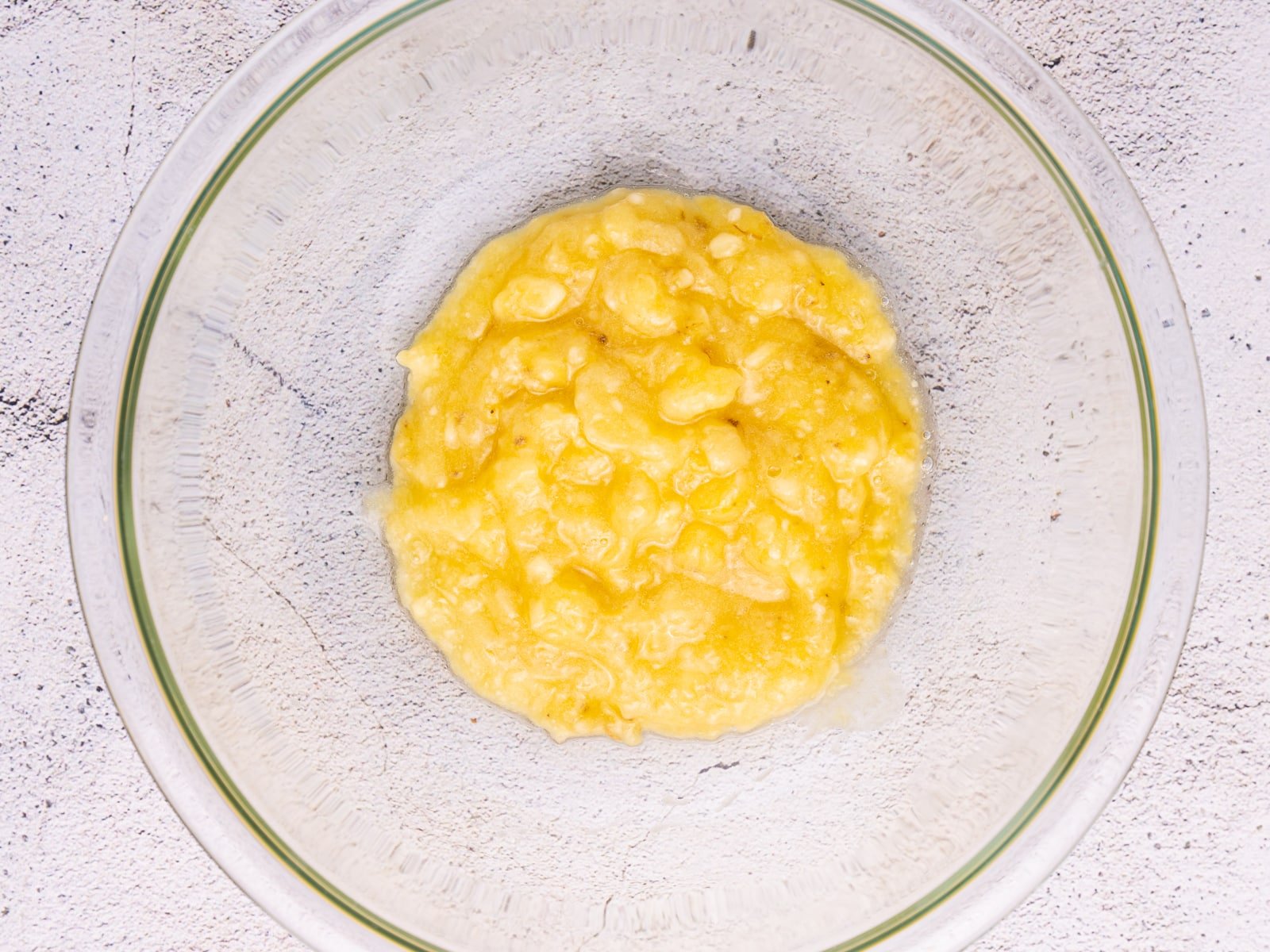 Mashed banana in a bowl. 