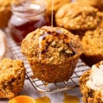 Vegan honey drizzling over the top of a delicious looking vegan morning glory muffin.