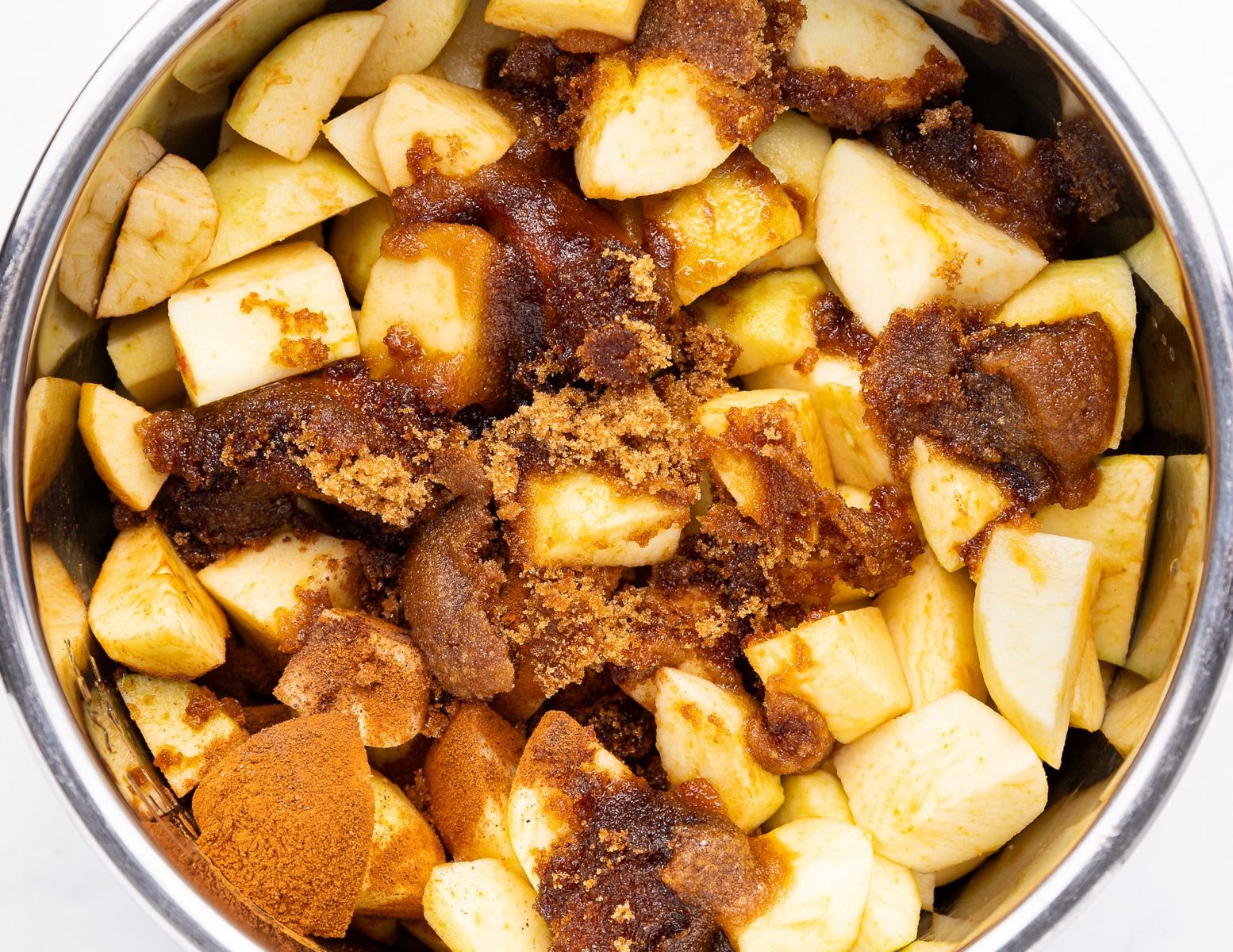 slow cooker apple butter ingredients in the slow cooker