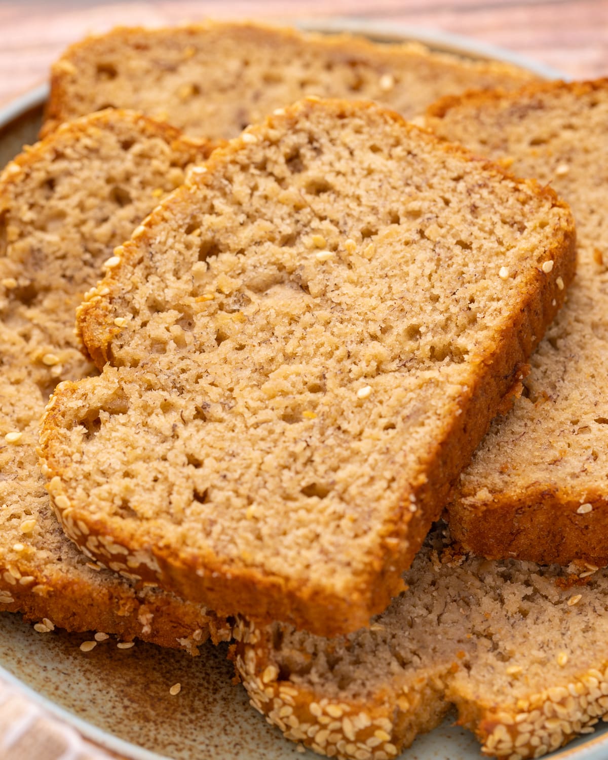 a close up of a slice of tahini banana bread