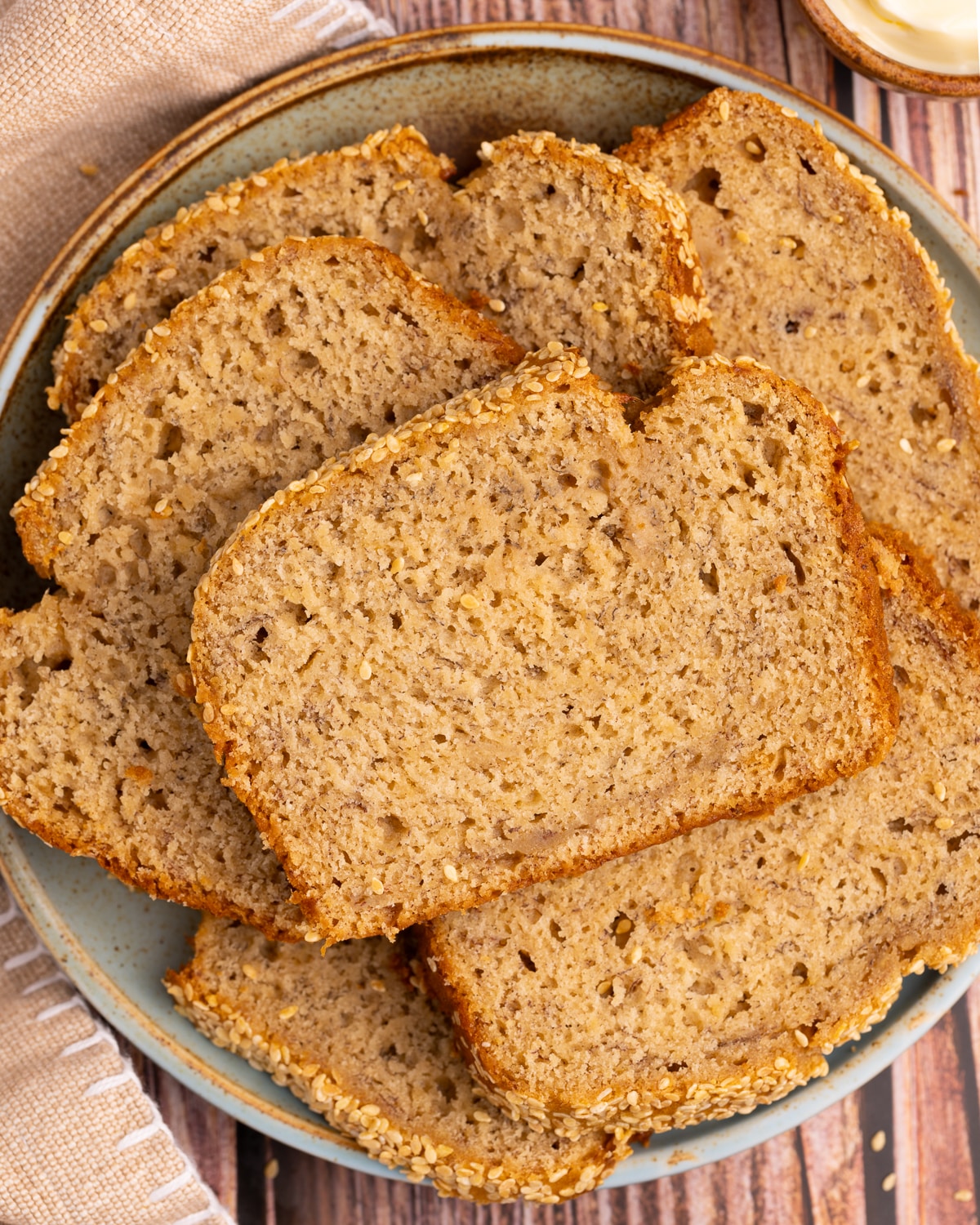 slices of tahini banana bread on a blue plate