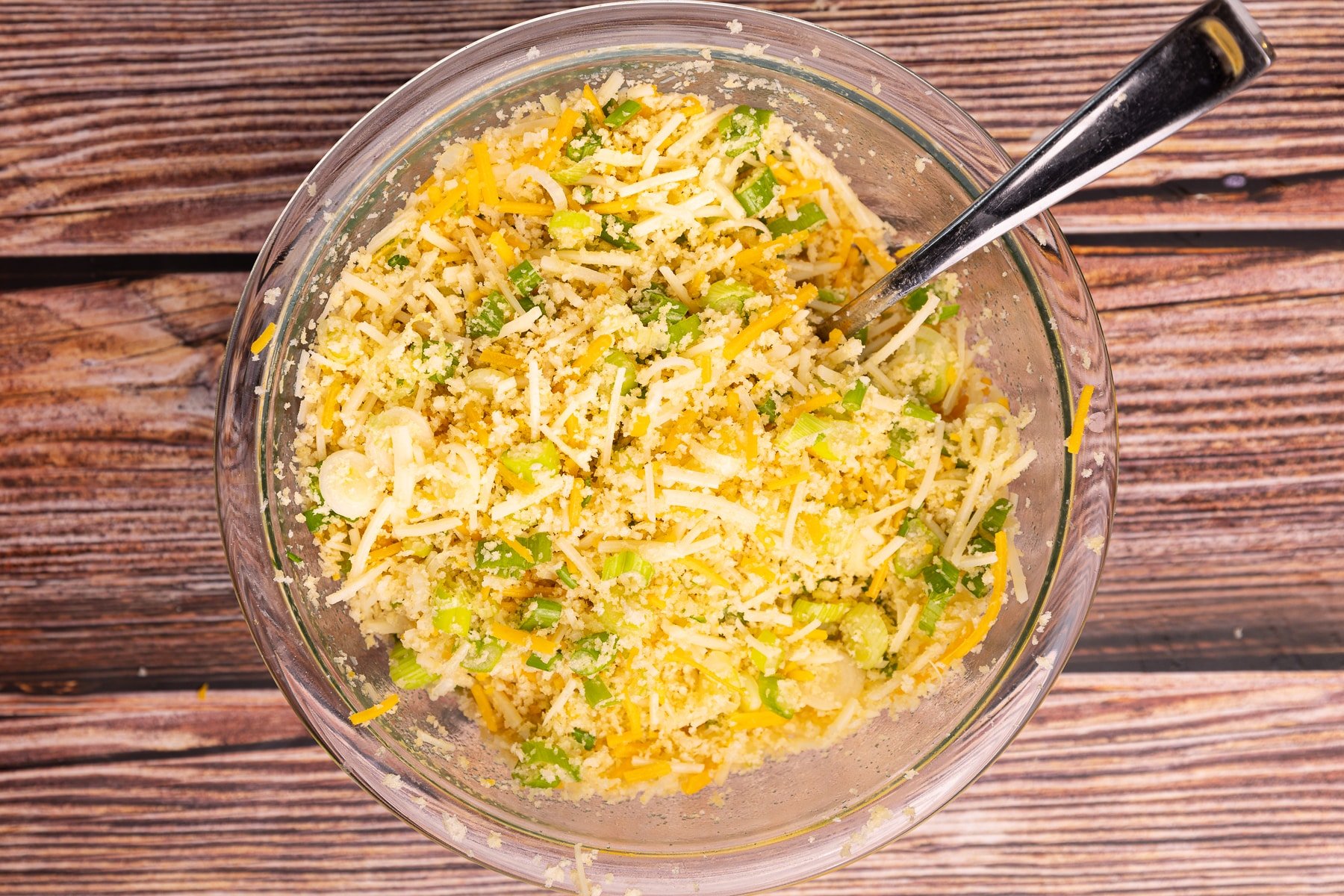 panko crumbs, cheese, green onions, and melted butter mixed up in a small bowl. 