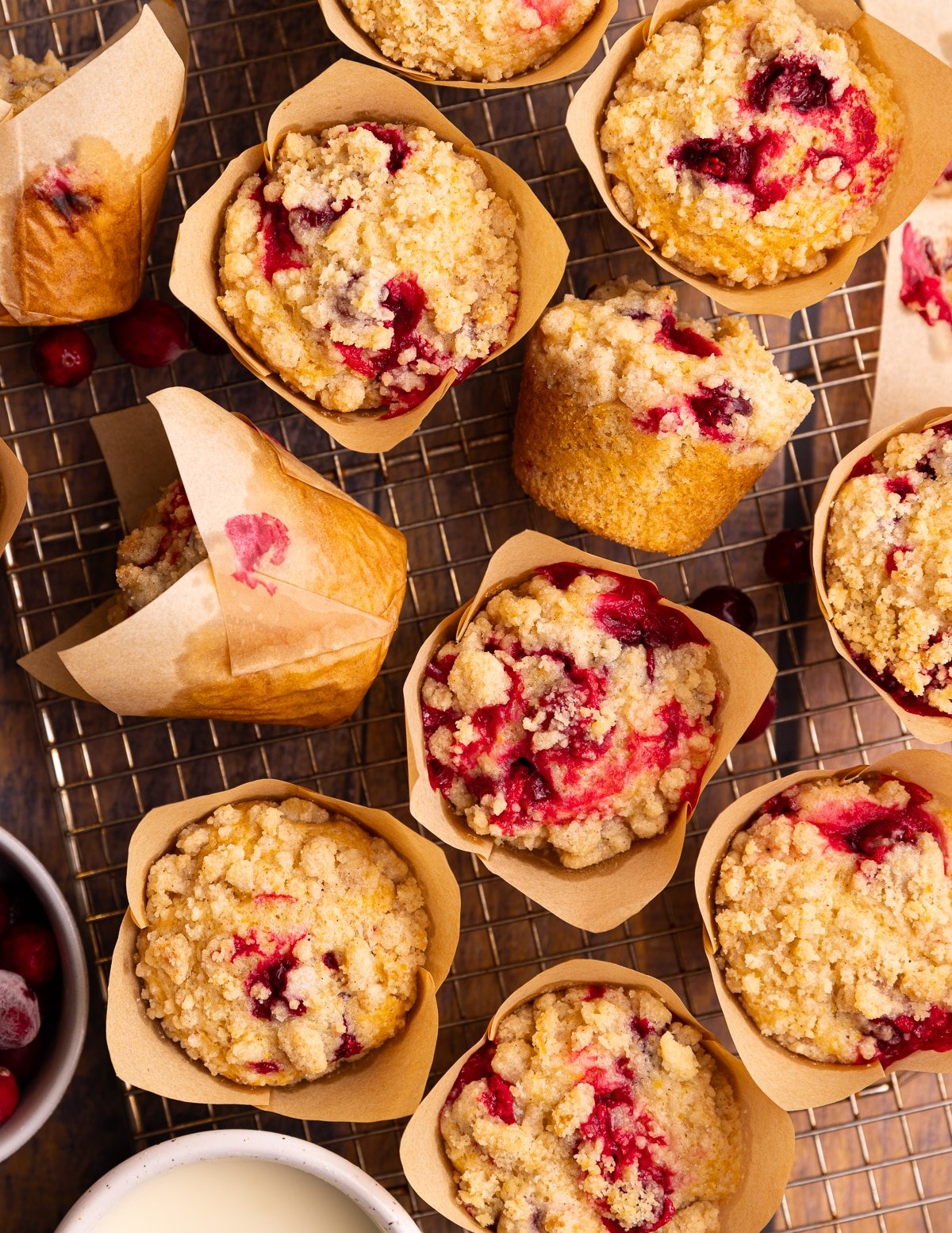 delicious looking cranberry orange muffins on a wire rack