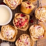 vegan cranberry orange muffins on a wire rack