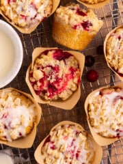 vegan cranberry orange muffins on a wire rack