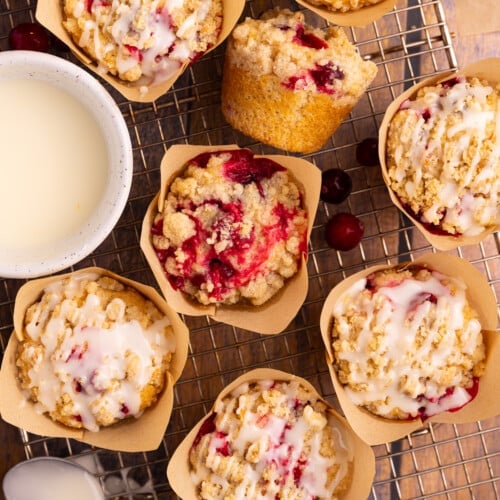 vegan cranberry orange muffins on a wire rack