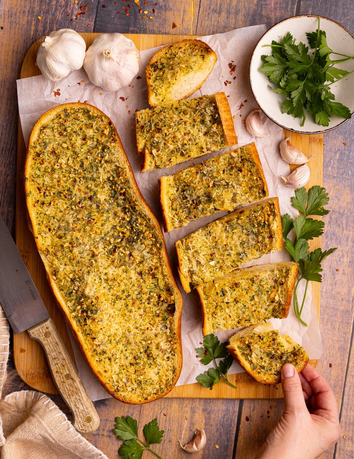 2 large pieces of garlic bread. One whole, and the other sliced. 