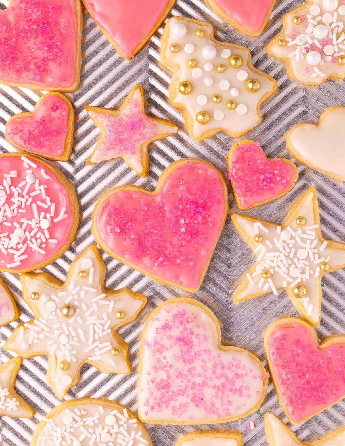 decorated sugar cookies on a baking tray